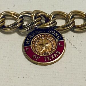 Hermann Sons of Texas Goldtone 8” Charm Bracelet.